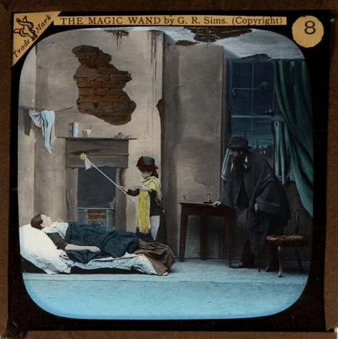 Then raising her wand, she waved it